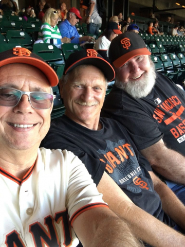At a Giants game with Paster Steve and buddy Dwayne. Selfie shot of the 3 amigos in the seats at Oracle Park.