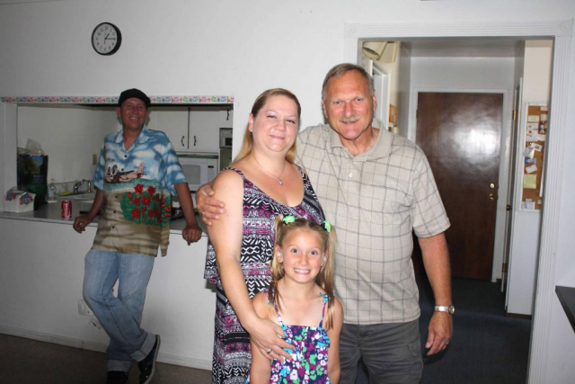 Photo with his step-daughter RuthAnn and granddaughter Rheanna. Family photo in the living room of an apartment