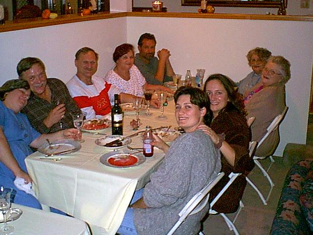 Family meal (lr): Brother Rick, Laren, his second wife Beverley, brother-in-law Norman, Alice, his mom Wanda Jean, his niece Mechelle and Iana. Family all sitting at a table after a meal.